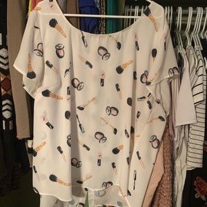 Cute makeup shirt. Worn twice.